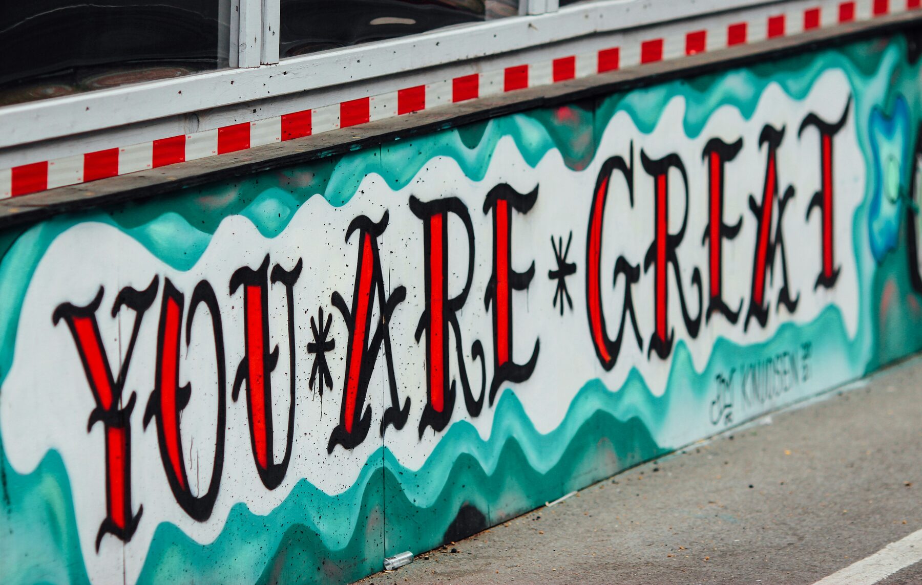 Hand-painted mural reading "You Are Great"